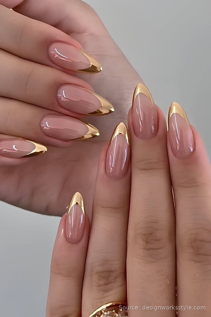 Gold chrome French tip nails on nude almond nails