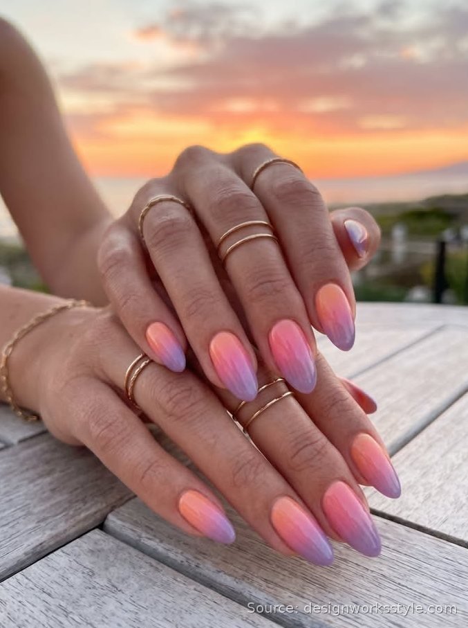 Peach to lavender ombre sunset nails photographed at golden hour