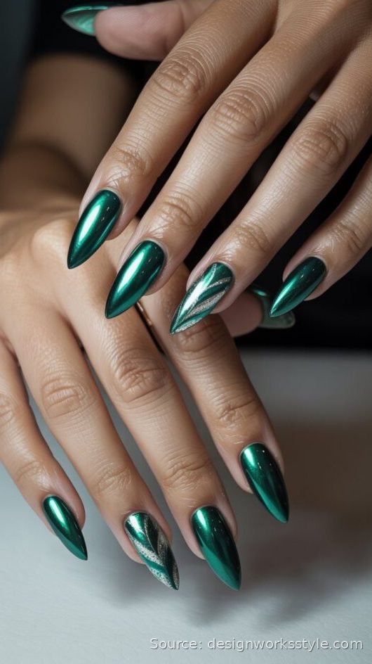 Emerald green chrome nails with a rich metallic mirror finish