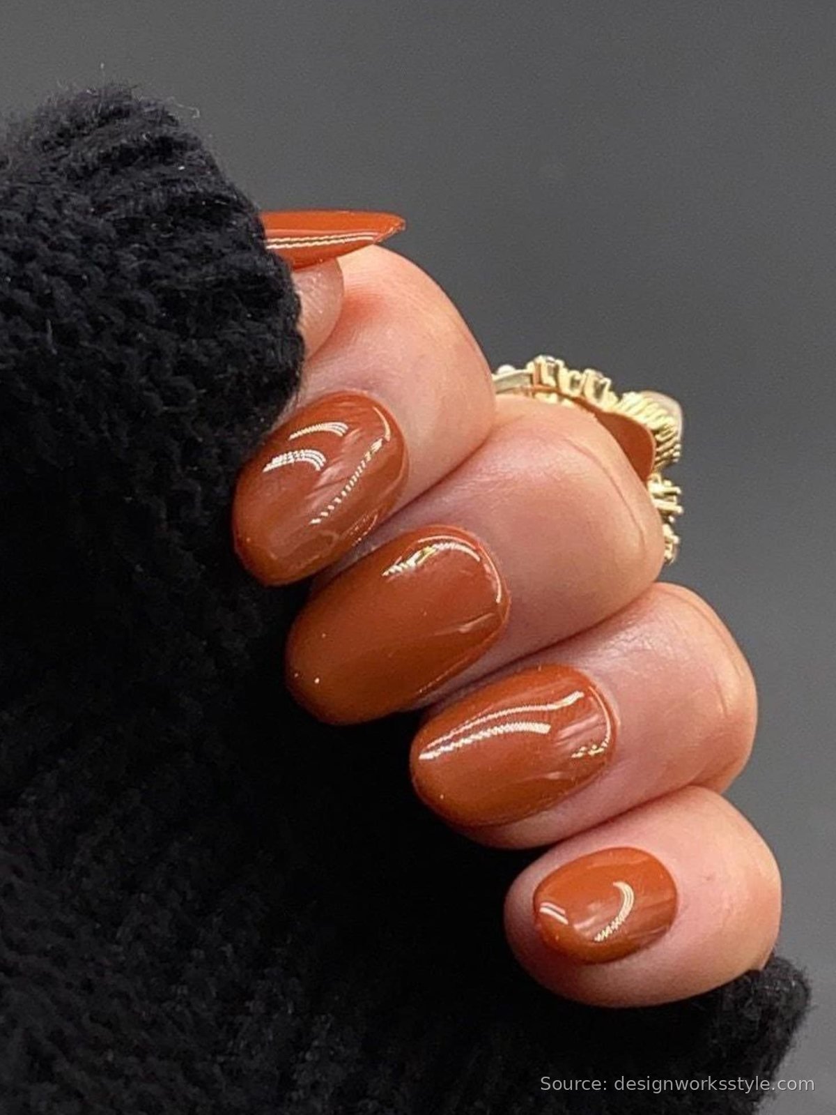 Glossy burnt orange hot cider nails