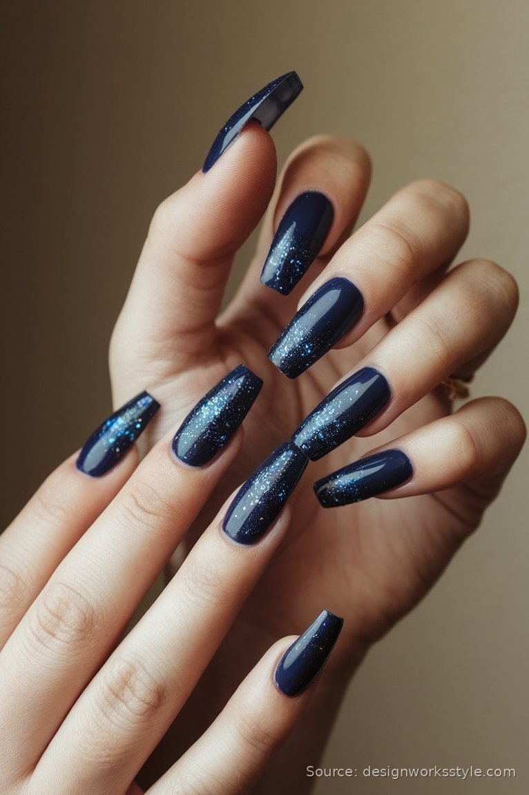 Midnight blue glitter nails on long coffin nails for New Year's Eve