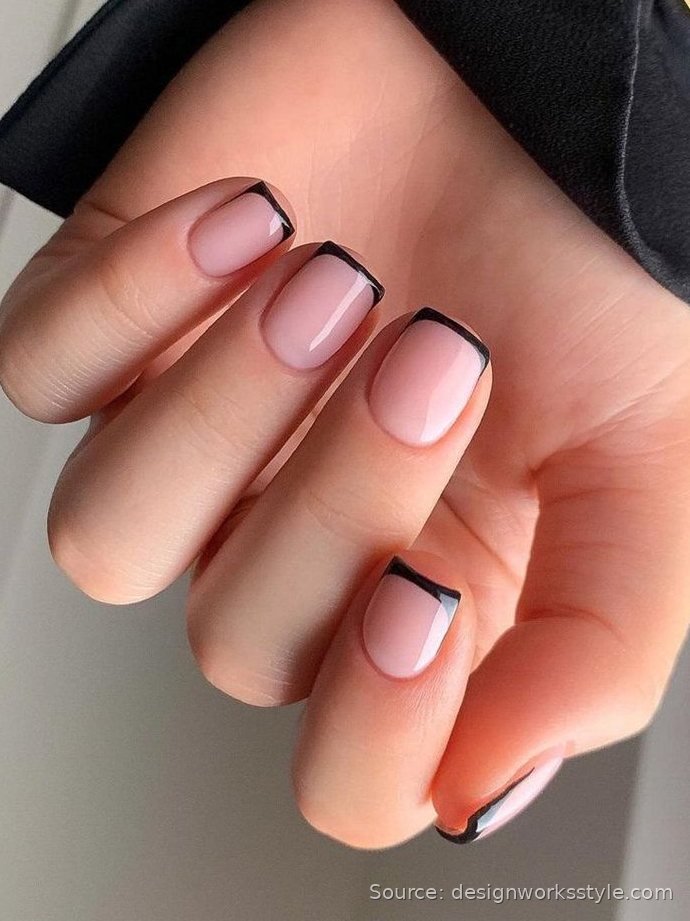 Thin black micro French tips on nude nails