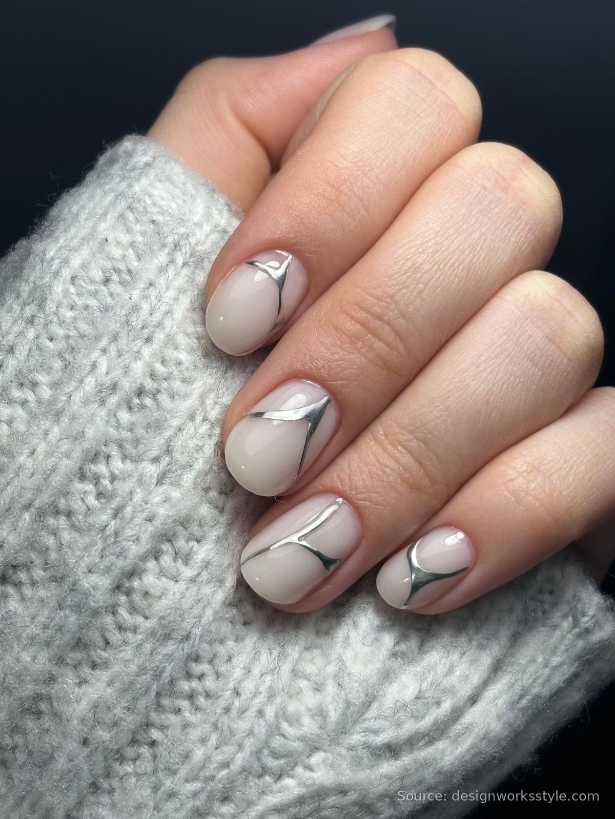 Minimalist silver chrome line nail art on milky nude nails for New Year's Eve