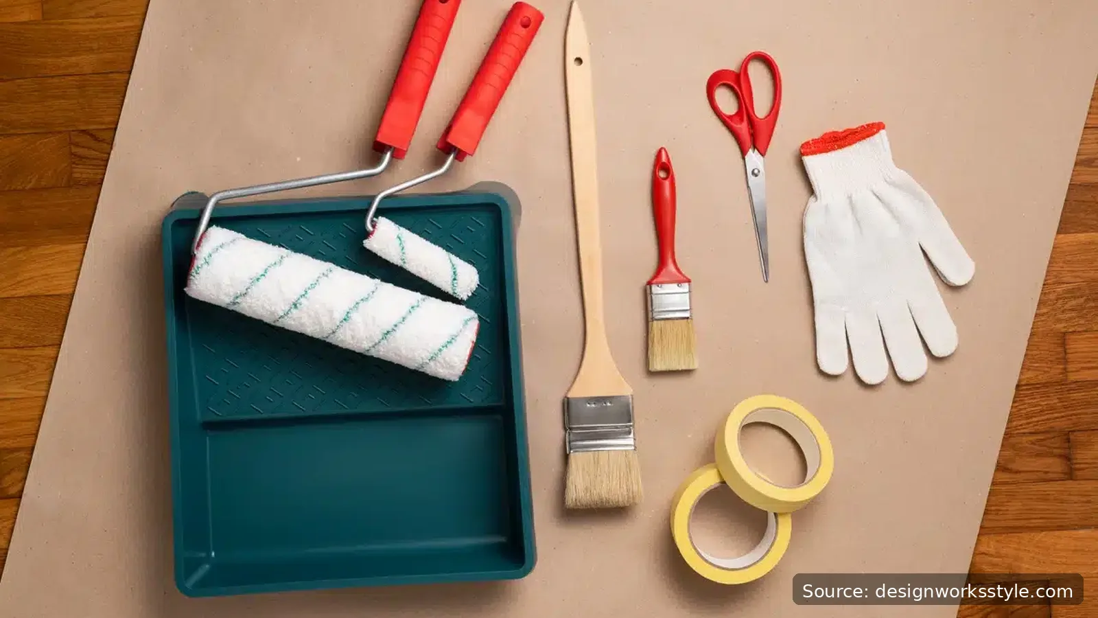 Painting supplies laid out: roller, tray, angled brush, painter's tape, drop cloth