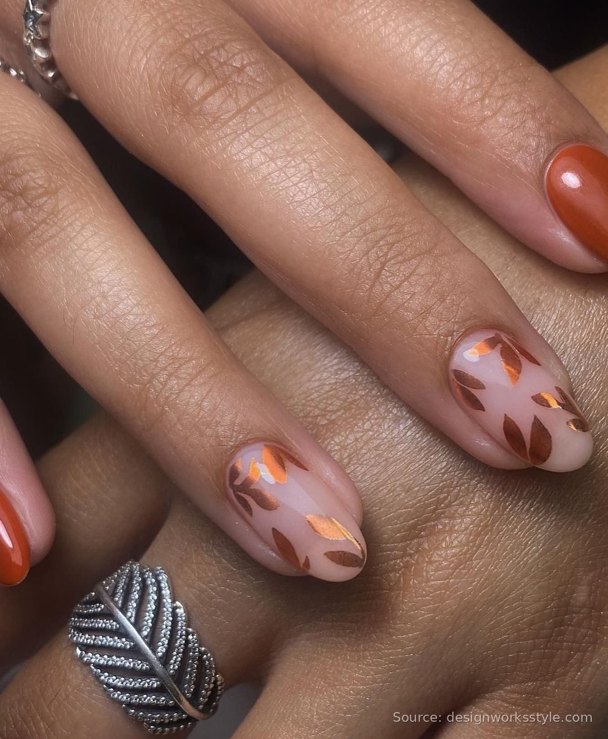 Solid pumpkin spice nails with copper leaf accents