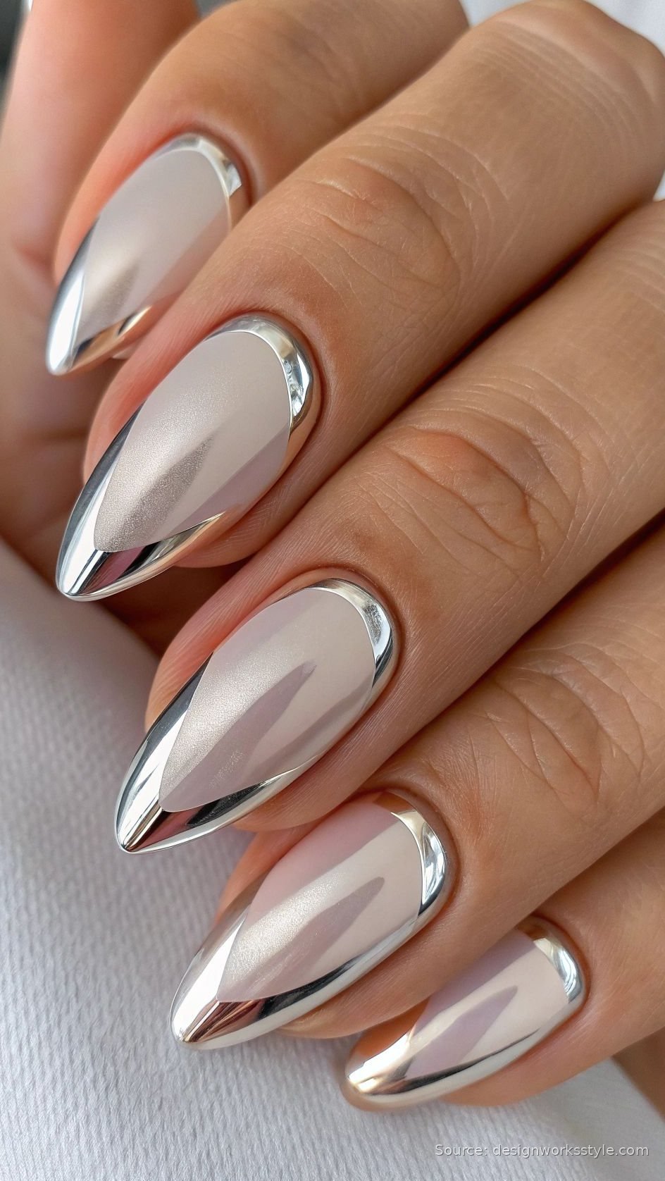 Silver chrome French tip winter nails on nude almond nails