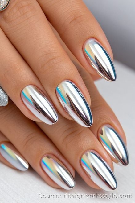 Silver mirror chrome nails with a reflective liquid metal finish