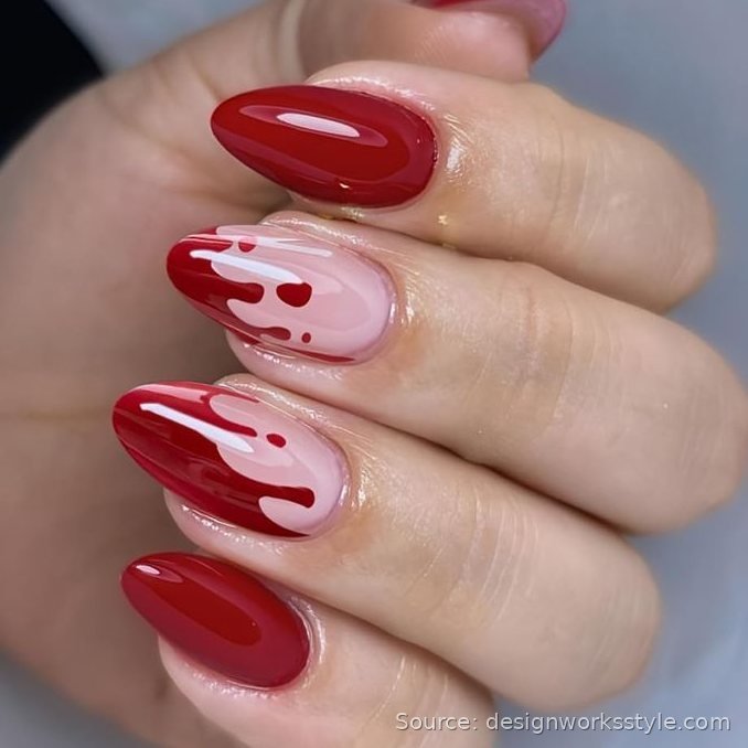 Vampire red almond nails with nude drip accent nails for Halloween